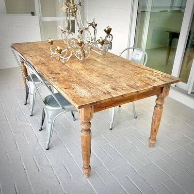 Pottery Barn dining table with four metal chairs 