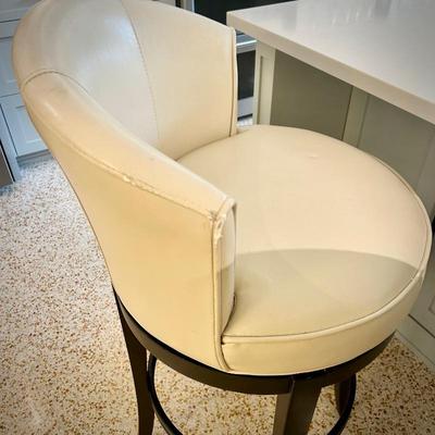 Second of two Pier 1 swivel bar stools
