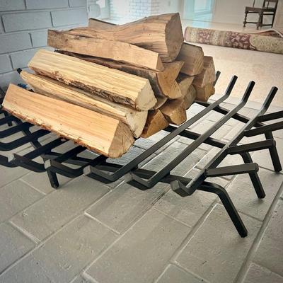 Fireplace grate and wood logs