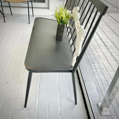 Second of two metal outdoor benches