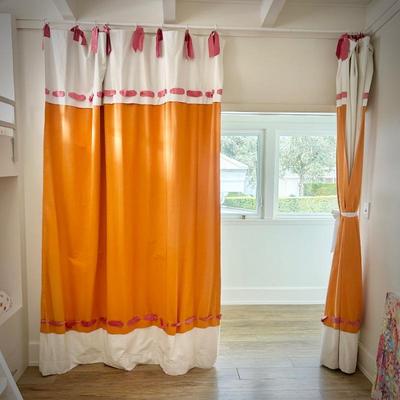 Oversized pink, orange and white curtains