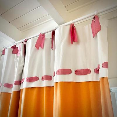 Oversized pink, orange and white curtains