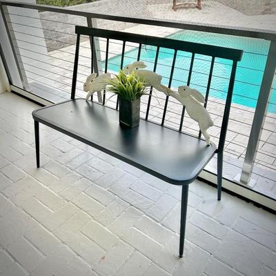 Second of two metal outdoor benches