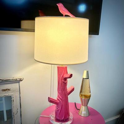 Pink log lamp with bird finial