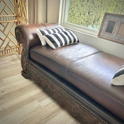 Leather and carved wood chaise