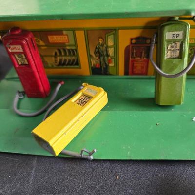 Rare petroleum station w/ 3 cast iron gas pumps