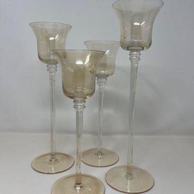 Four Vintage Long-Stemmed Amber Candleholders