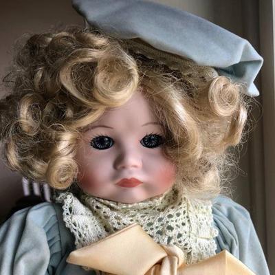 1980/1990 Vintage French Dol with porcelain head, hand and half legs. She has a pretty moody mouth with bleu glass eyes and blonde curly...