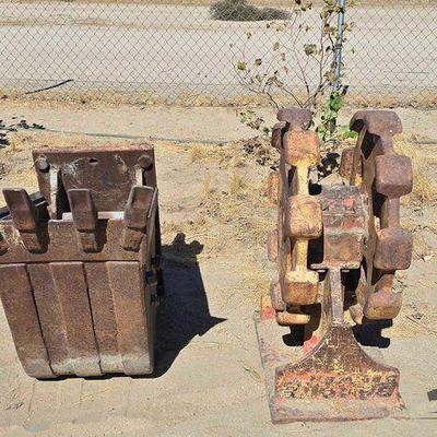 #2516 • Backhoe Bucket and Compaction Wheel with Custom Adapter
