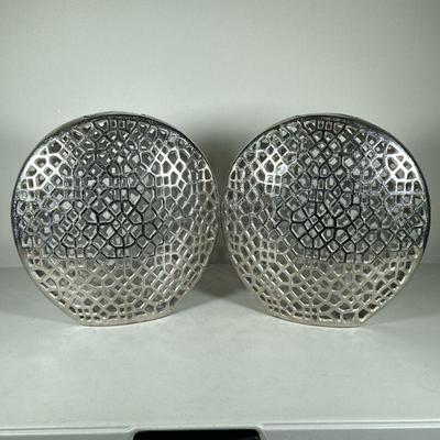 (2pc) PAIR ALUMINUM JALI VASES | Round aluminum vases with geometric patterns cut through sides and opening on top - h. 14.5 x w. 4 x l....