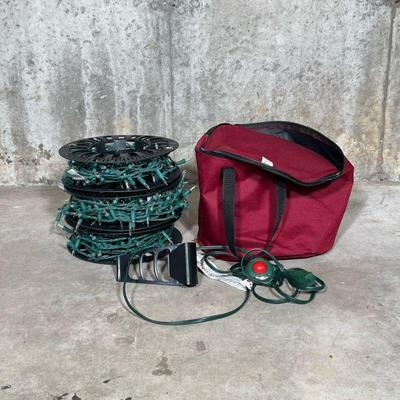 CHRISTMAS LIGHTS | 3 spools of white LED Christmas lights with outdoor extension cord and carrying case.


