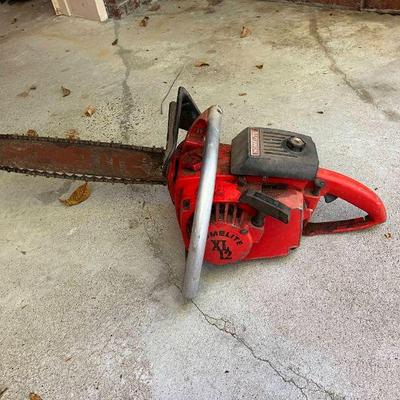 Lot 067-GAR: Vintage Homelite UT-10445C XL-12 Chainsaw

Features: 
•	Manufactured around late 1970s/early 1980s

Dimensions: 16” bar...