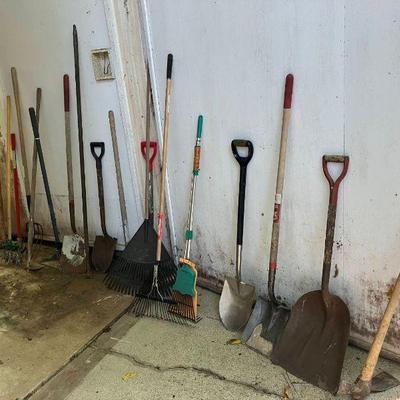Lot 060-GAR: Yard and Garden Tool Assortment

Features: A collection of over two-dozen yard and garden tools: rakes, shovels, a pole saw...