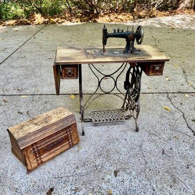 Lot 032-GAR: Antique Ruby Sewing Machine & Table

Features: 
•	Project piece with lots of vintage charm!
•	Sewing table includes...