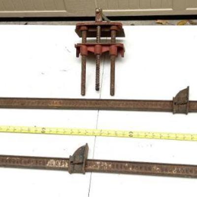 Lot 010-WSP: Vintage Clamp & Vice Trio

Features: 
•	Pair of Vintage cast-iron Hargrave Metal Bar Clamps
o	Red-painted wooden...