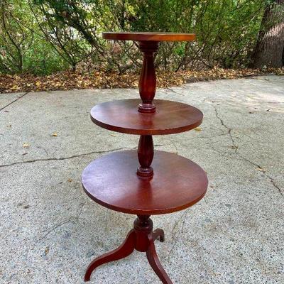Lot 025-GAR: Three-tiered Pedestal Table

Features: 
A classic design that features a rich, warm cherry/mahogany finish and gracefully...