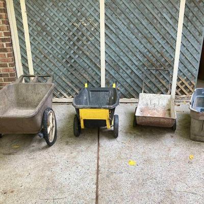 Lot 057-GAR: Three Carts and a Bin

Includes: Three utilitarian two-wheeled carts and one large wheeled storage bin.

•	Rubbermaid Garden...