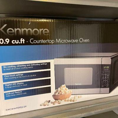 Lot 048-GAR: Kenmore Countertop Microwave

Features: 
•	New-in Box Kenmore microwave
•	Stainless-Steel finish
•	Model #KMCMWP09S2-09
•...