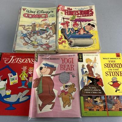 Lot 81 | Vintage Comics: Disney, The Flintstones, & More
