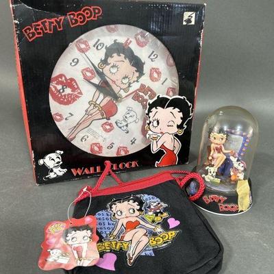 Lot 57 | Vintage Betty Boop Clock, Purse & Globe Figurine
