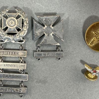 Lot 111 | WW2 Army Marksman & Air Force Badges
