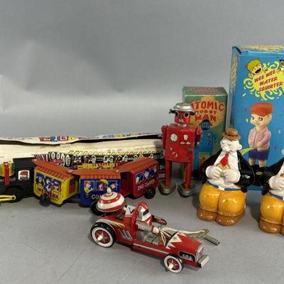 Lot 282 | Vtg Tin Toys & More
