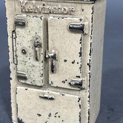 Lot 118 | Antique Cast Iron Kevinator Coin Bank
