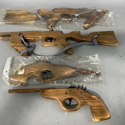 Lot 29 | Vintage Four Wood Rubber Band Guns
