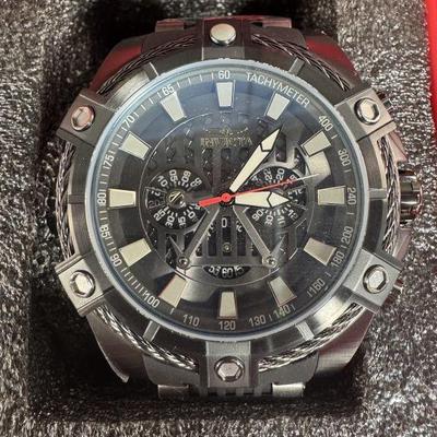 Lot 220 | Invicta Case and 1 Invicta Watch
