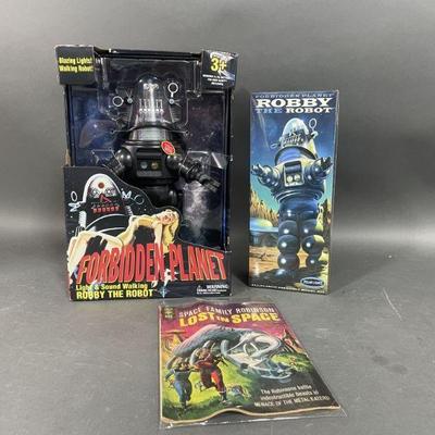 Lot 155 | Robot Toys and Magazine
