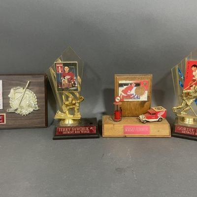 Lot 204 | Plaques and Trophy’s Red Wings
