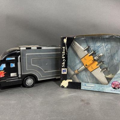 Lot 210 | Hot Wheels Matchbox Car Case and Plane Toy
