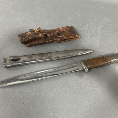 Lot 114 | WW2 Combat Bayonet & Scabbard
