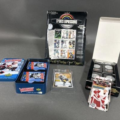 Lot 99 | ‘07 & ‘92 Hockey Player Cards & Folder Sleeves
