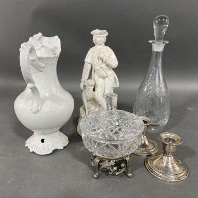 Lot 310 | Sterling Silver Candle Holders, and More

