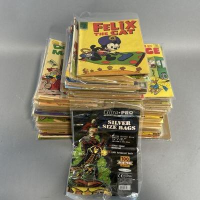 Lot 83 | Large Lot of Various Vintage Comics & More
