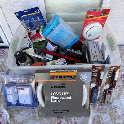 Let There Be Lights
Tote full of bulbs, flashlights, grill lighters, and more. 
