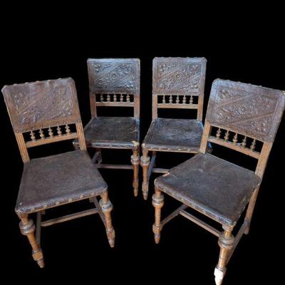 Lot #131 - Antique Embossed Leather Dining Chairs - Set of Four