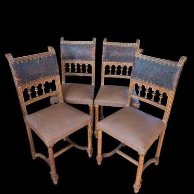 Lot #132 - Antique Embossed Leather Dining Chairs - Set of Four
