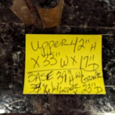 Measures:  Upper:  42"H x 33"W x 17"D
Base:  39"H w/Granite 34"W w/Granite x 23"D
