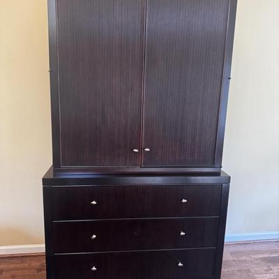 Sale Photo Thumbnail #67: Barbara Barry for Baker Furniture Reed Armoire Optimized for a television in the cabinet. Comes with two adjustable shelves and electrical output on the back panel. Base is anchored with three expansive drawers open to the outside. Reeded surfaces are sta