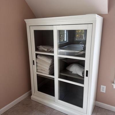 Ballard Designs Cortona Library Bookshelf Overall: 58 1/4"H X 46 3/4"W X 17 1/2"D (156 lbs)
Interior Cabinet: 54...