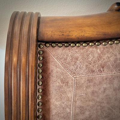 Queen bed with wood and leather headboard and footboard