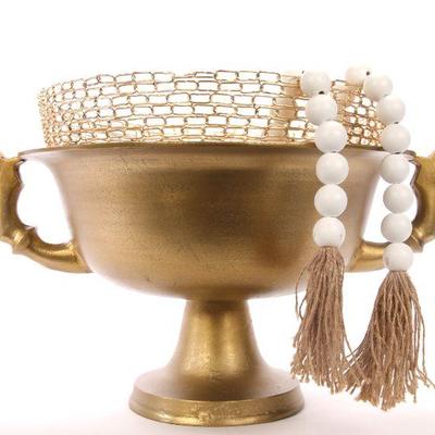 Large gold metal urn