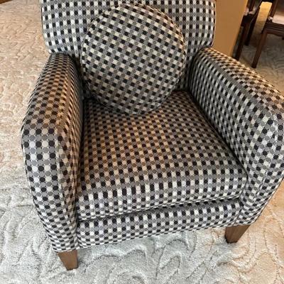 Checkered cushioned armchair