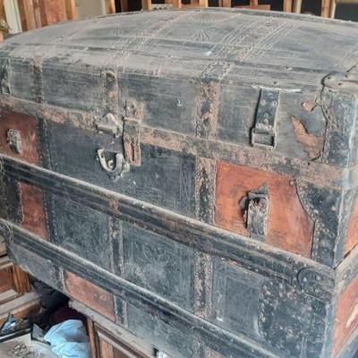 Camel back trunk in barn
