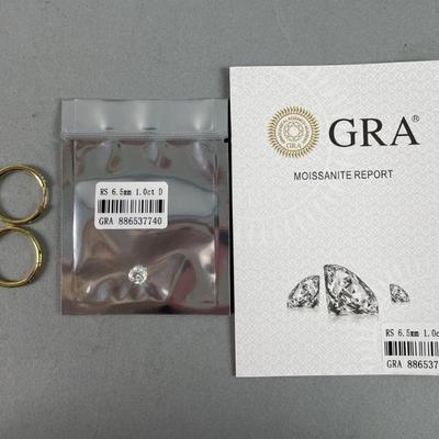 Lot 316 | 1 ct Moissanite Stone & Gold Colored Hoop Earrings
