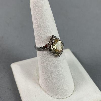 Lot 308 | Oval 1.66 ct Citrine and Diamond Sterling Ring
