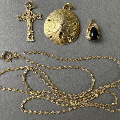 Lot 148 | 14K Crucifix, 10K Chain & Pendant & More
