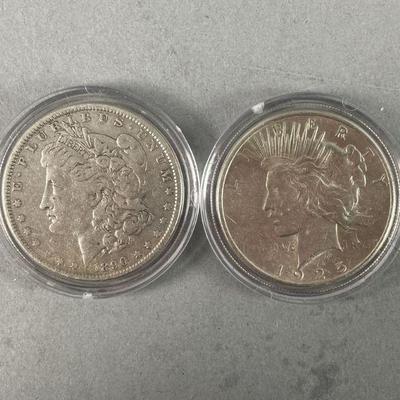 Lot 262 | 1890 Morgan and 1925 Peace Silver Dollars
